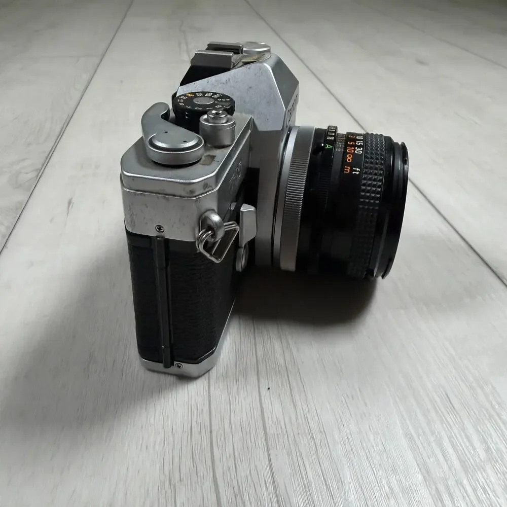 Canon TX 35mm SLR Film Camera with Canon FD 50mm f/1.8 Lens – Parts or Repair